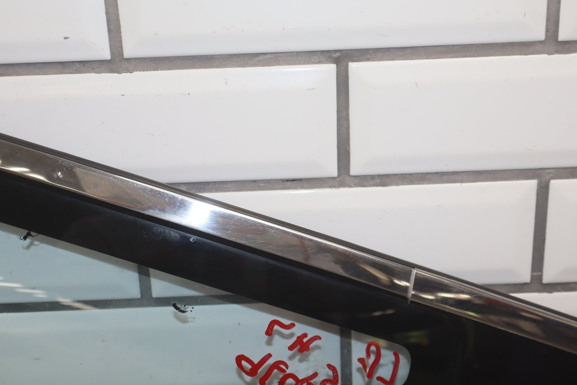 1986 Nissan 300ZX Left Quarter Window OEM | Chrome Dented