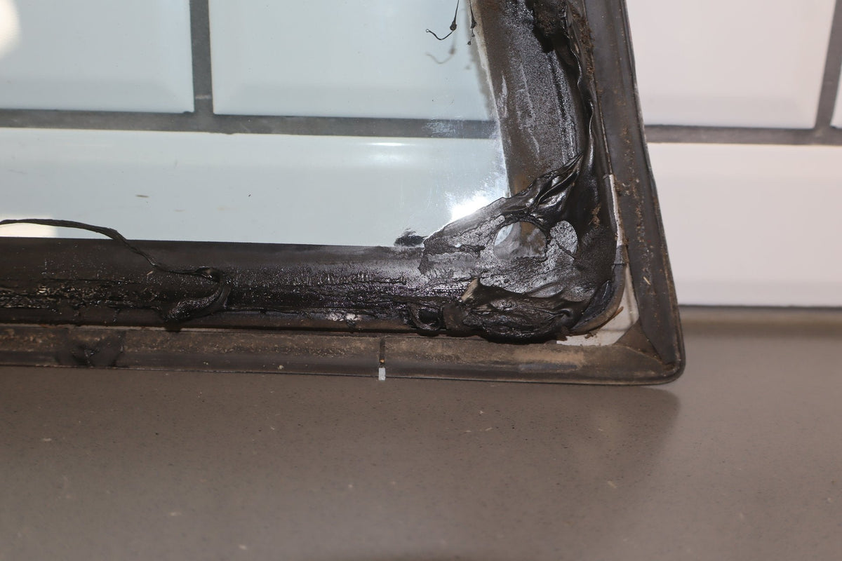 1986 Nissan 300ZX Left Quarter Window OEM | Chrome Dented