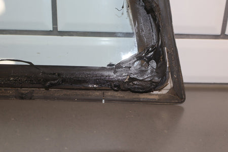 1986 Nissan 300ZX Left Quarter Window OEM | Chrome Dented