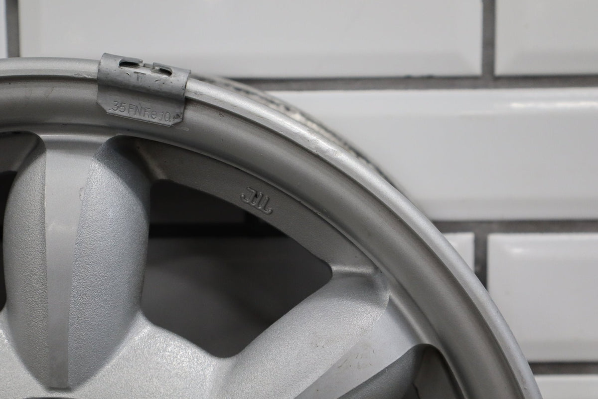 1990-1992 Mazda Miata NA Single (1) 14x5.5 Silver Daisy Wheel W/Center Cap