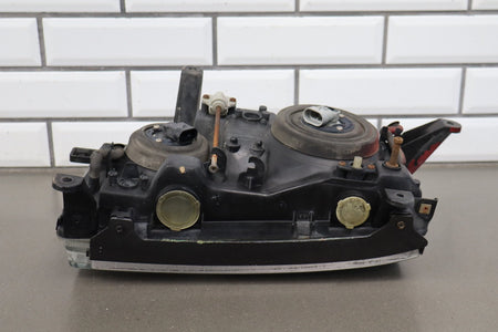 1991-1995 Toyota Land Cruiser Left Headlamp 8111060394