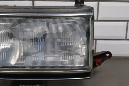 1991-1995 Toyota Land Cruiser Left Headlamp 8111060394