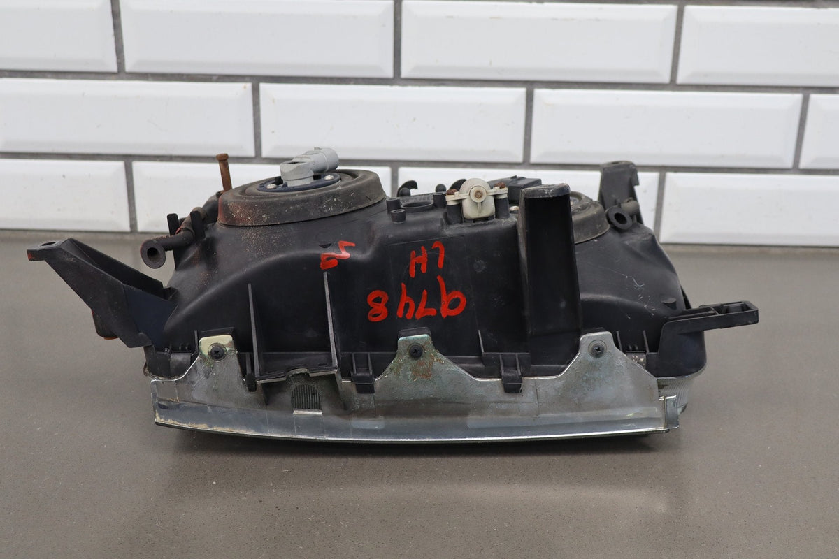 1991-1995 Toyota Land Cruiser Left Headlamp 8111060394