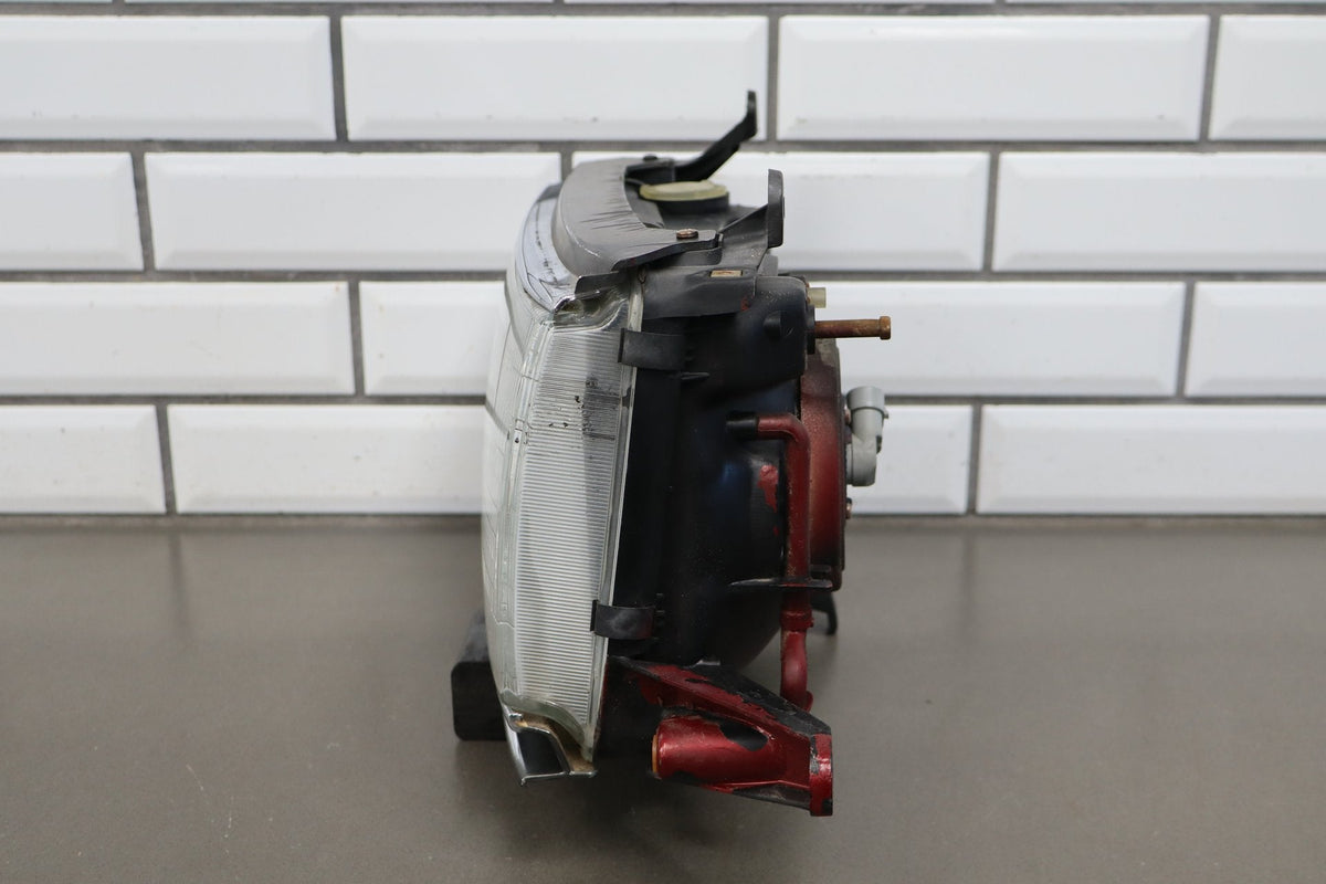 1991-1995 Toyota Land Cruiser Left Headlamp 8111060394