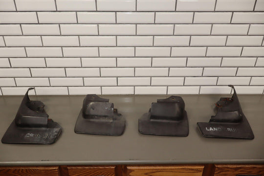 1991 - 1997 Toyota LandCruiser OEM Set of 4 Splash Guard Mud Flaps *Torn Tabs*