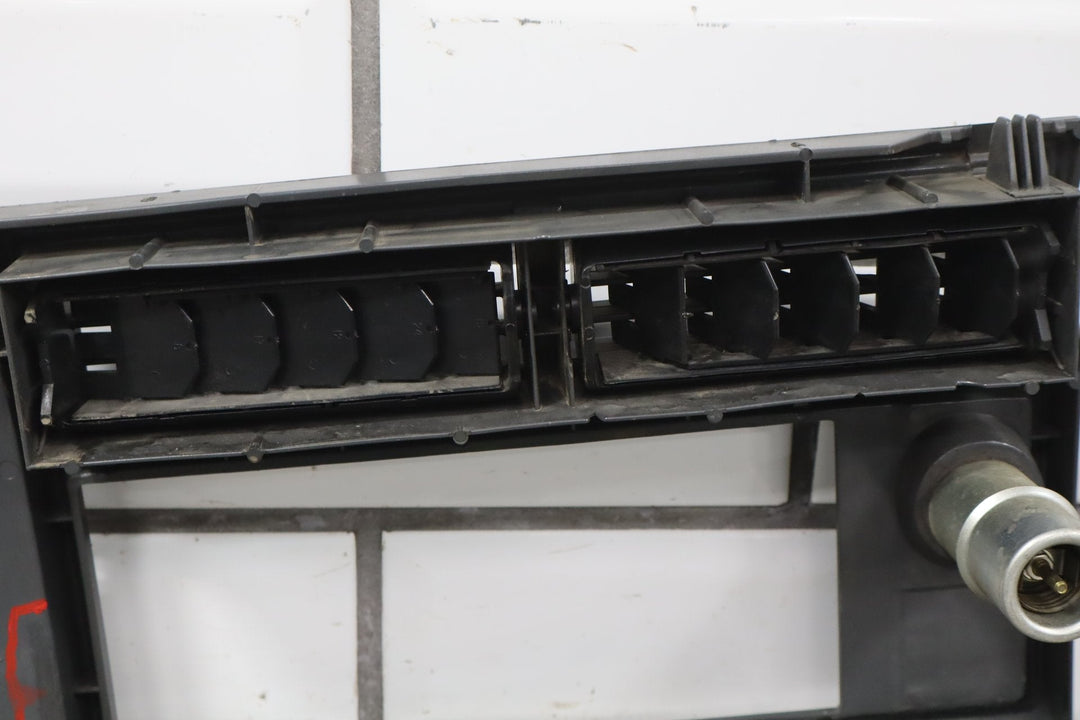 1992 Chevrolet S10 Radio Bezel OEM Charcoal with Cigarette Lighter