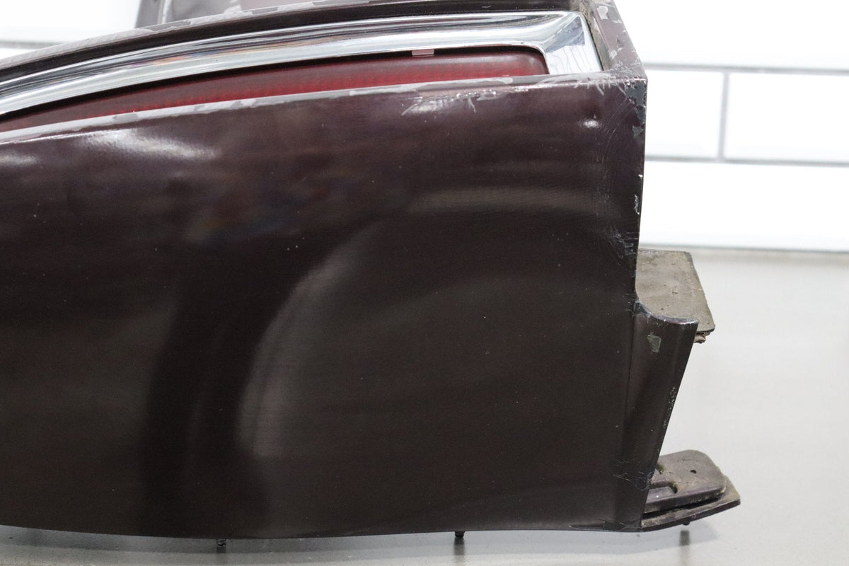 1993-1996 Cadillac Fleetwood Left Tail Light W/ Filler Panel Dark Cherry 77