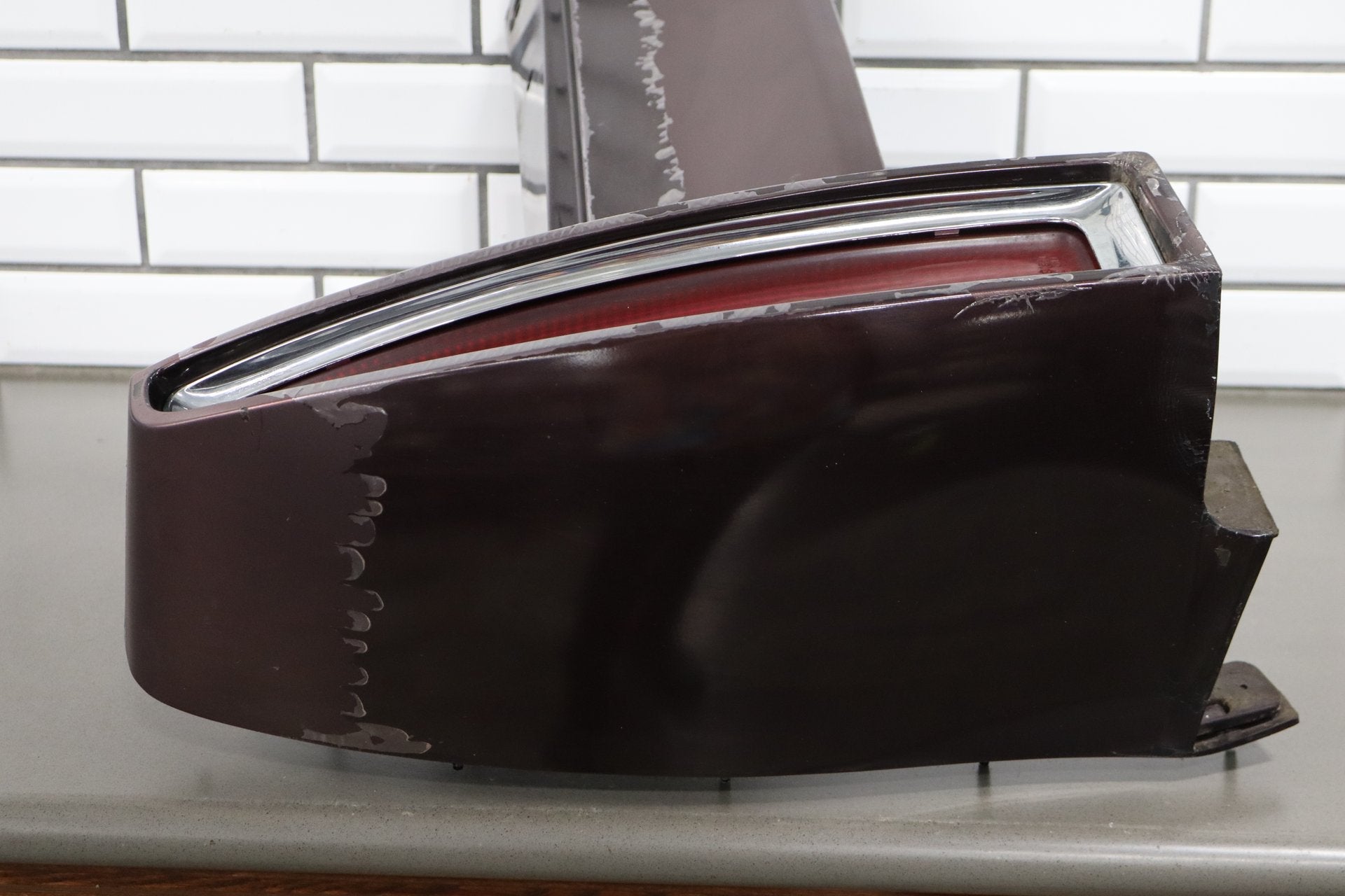 1993-1996 Cadillac Fleetwood Left Tail Light W/ Filler Panel Dark Cherry 77