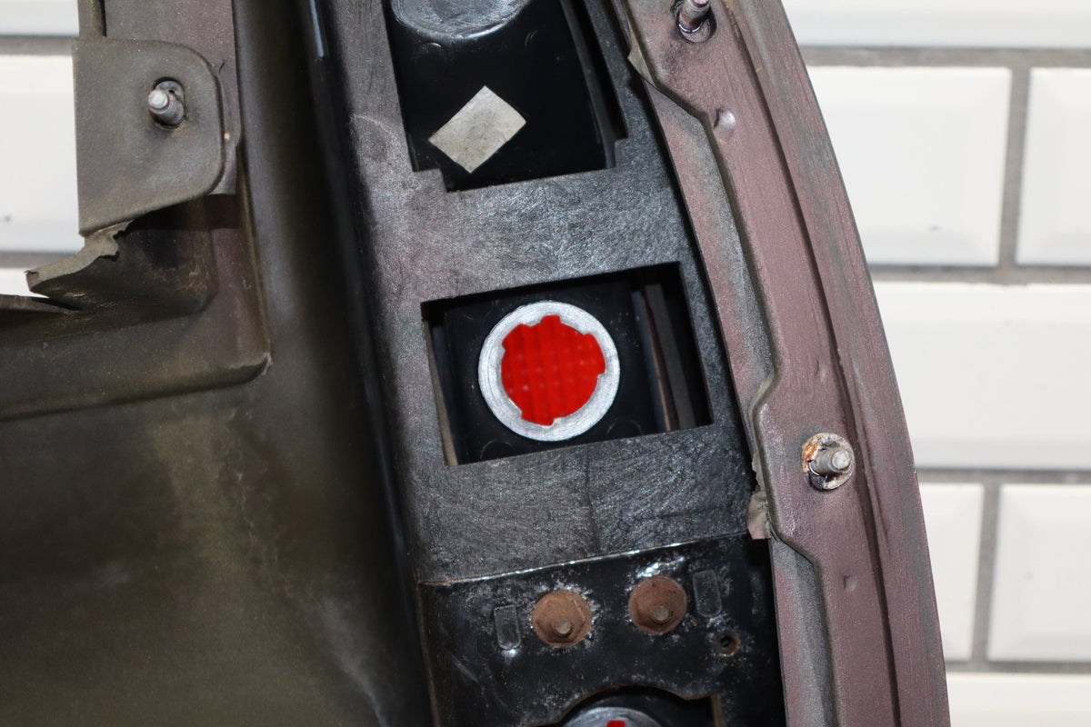 1993-1996 Cadillac Fleetwood Left Tail Light W/ Filler Panel Dark Cherry 77