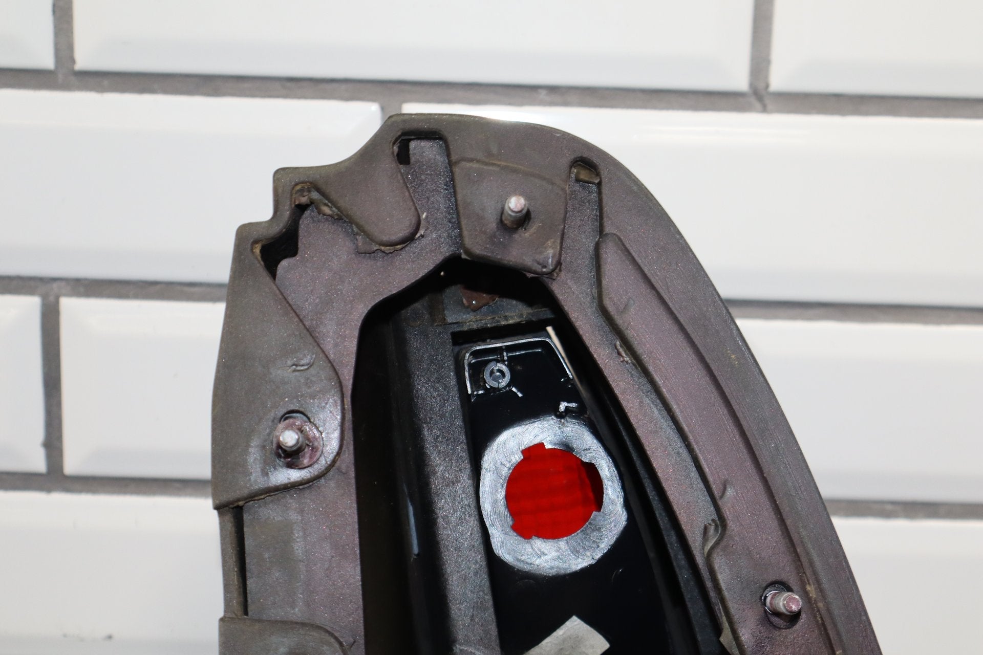 1993-1996 Cadillac Fleetwood Left Tail Light W/ Filler Panel Dark Cherry 77