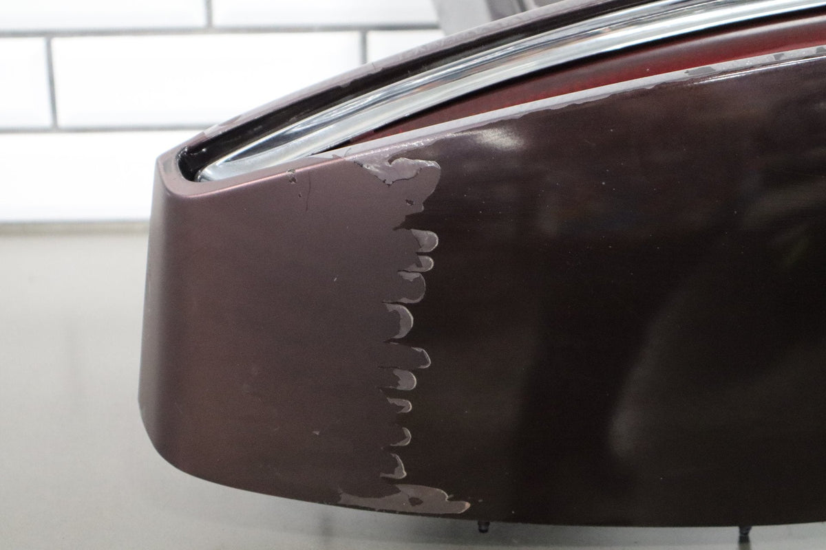 1993-1996 Cadillac Fleetwood Left Tail Light W/ Filler Panel Dark Cherry 77