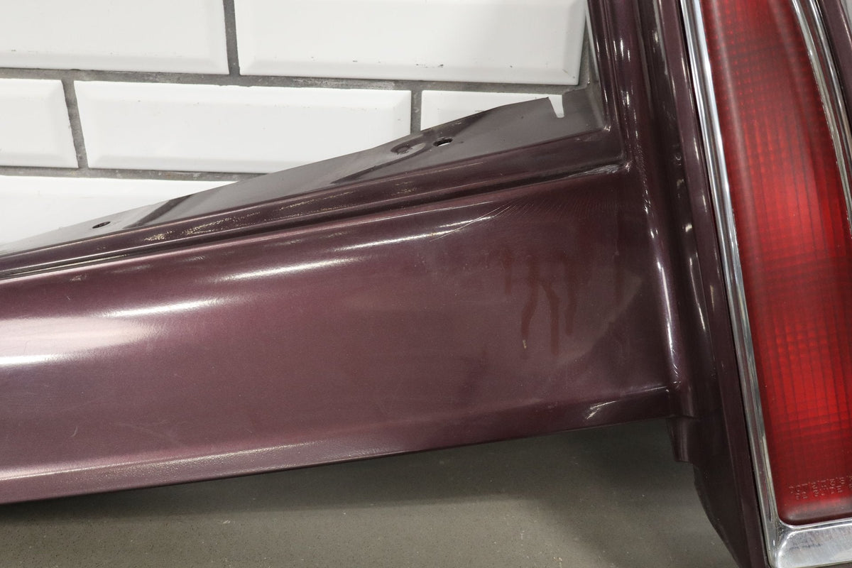 1993-1996 Cadillac Fleetwood Right Tail Light W/ Filler Panel Dark Cherry 77
