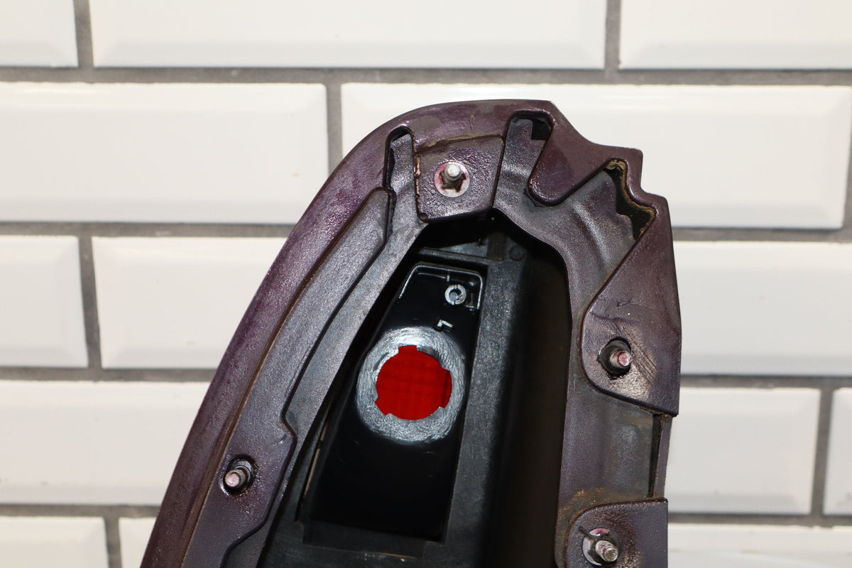 1993-1996 Cadillac Fleetwood Right Tail Light W/ Filler Panel Dark Cherry 77