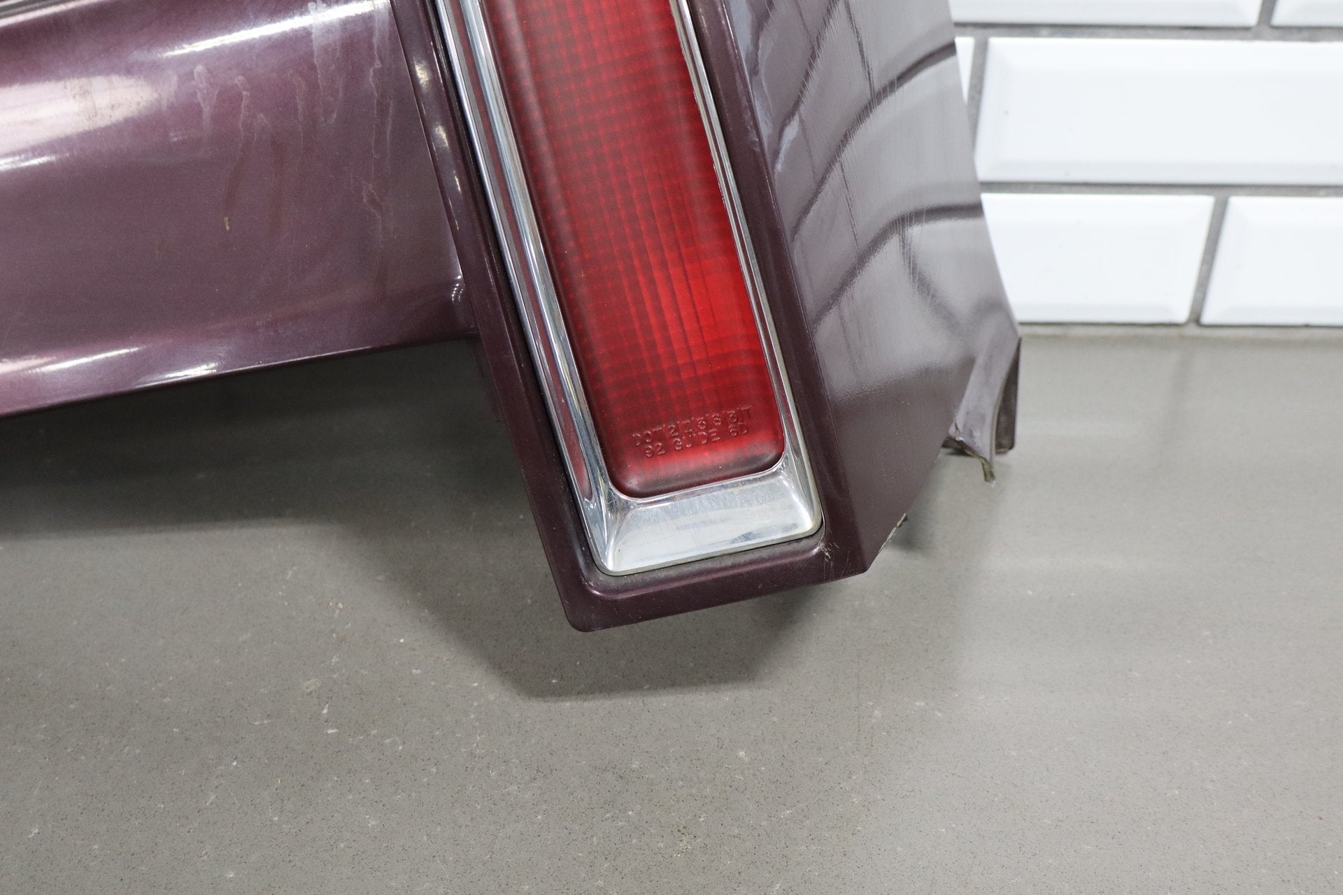1993-1996 Cadillac Fleetwood Right Tail Light W/ Filler Panel Dark Cherry 77