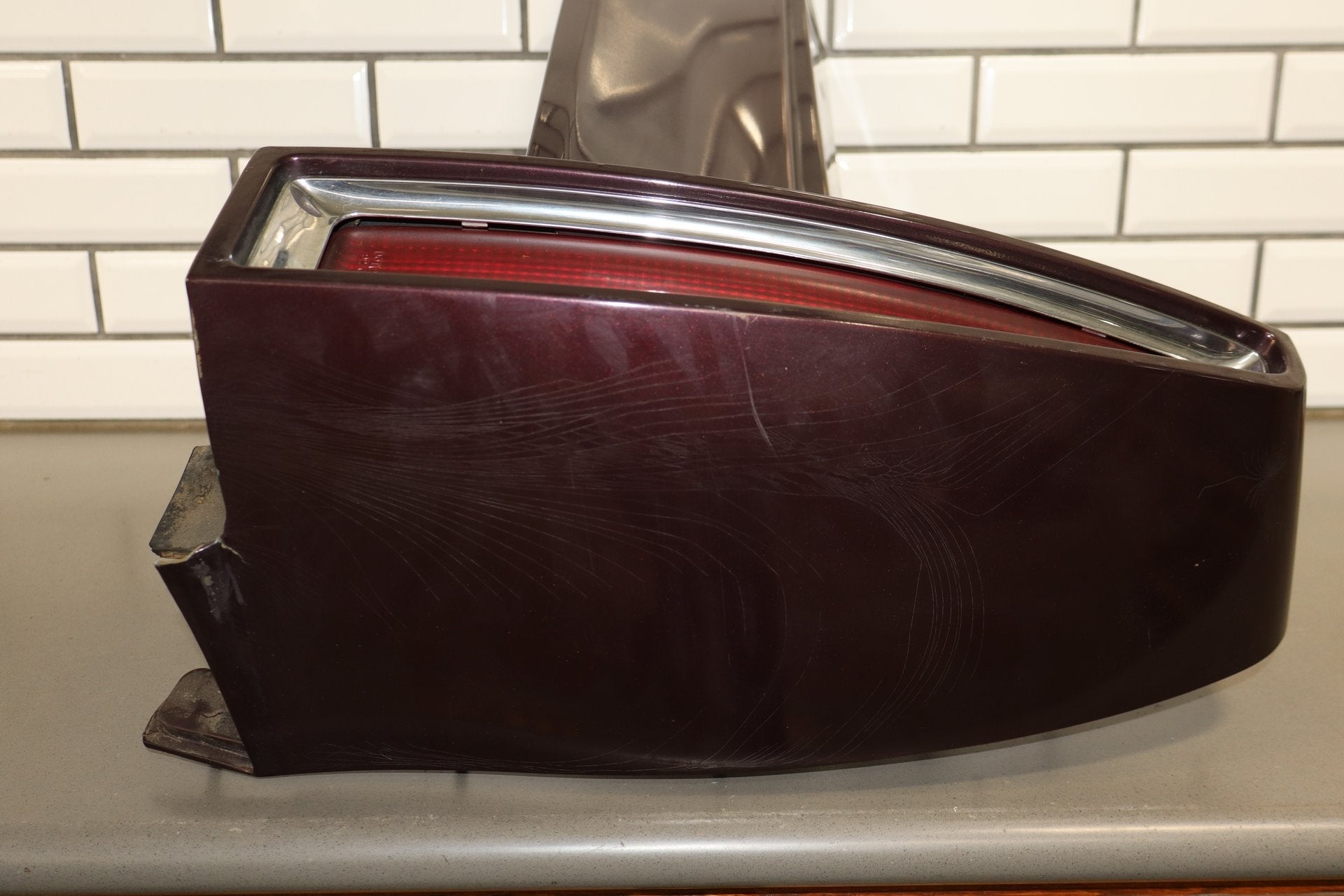 1993-1996 Cadillac Fleetwood Right Tail Light W/ Filler Panel Dark Cherry 77