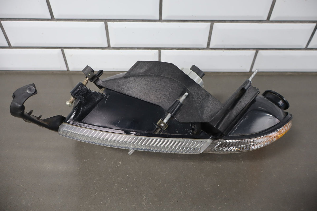 1994-2001 Dodge Ram 1500 Left Headlamp OEM w/Bracket