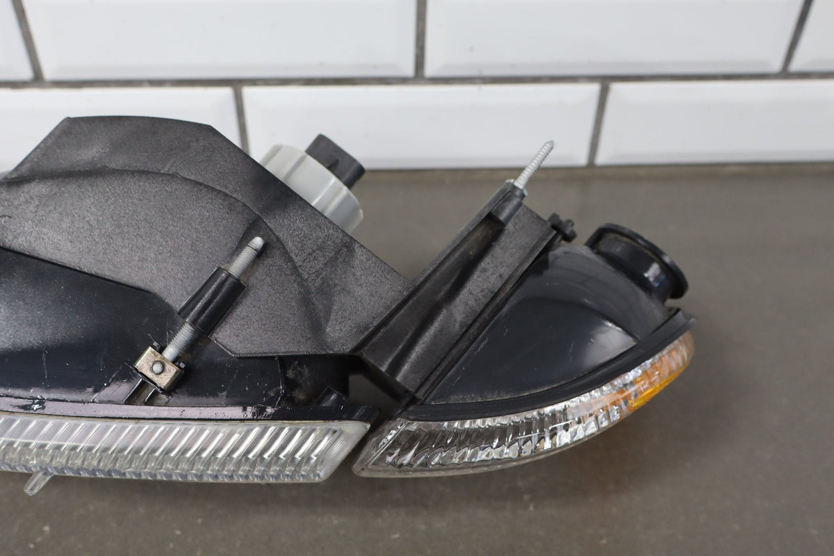 1994-2001 Dodge Ram 1500 Left Headlamp OEM w/Bracket