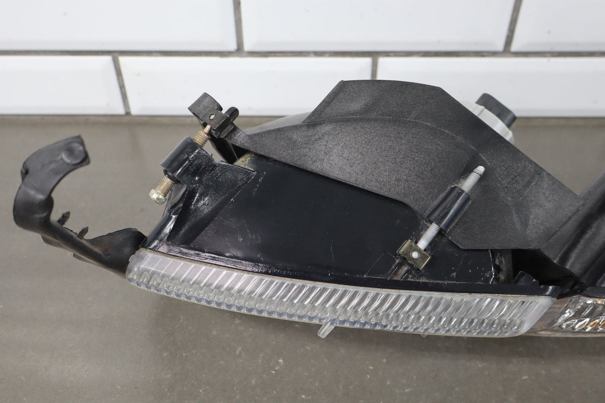 1994-2001 Dodge Ram 1500 Left Headlamp OEM w/Bracket