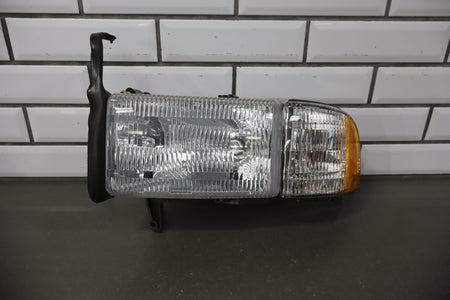 1994-2001 Dodge Ram 1500 Left Headlamp OEM w/Bracket