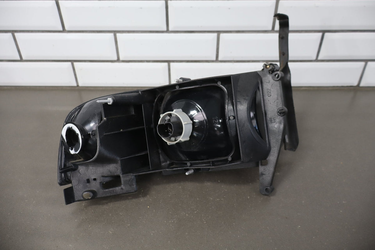 1994-2001 Dodge Ram 1500 Left Headlamp OEM w/Bracket