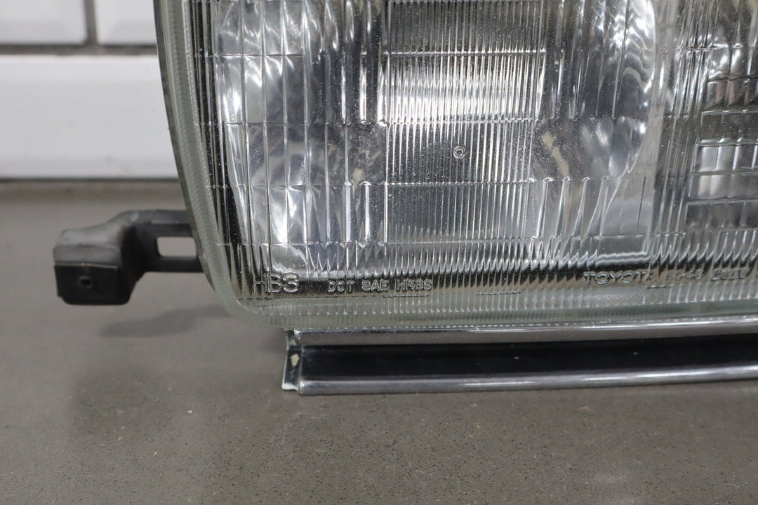 1995 - 1998 Toyota Land Cruiser Left Headlamp W/Chrome Trim 8111060395