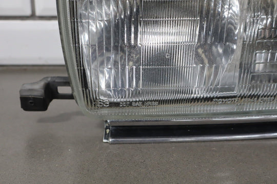1995 - 1998 Toyota Land Cruiser Left Headlamp W/Chrome Trim 8111060395