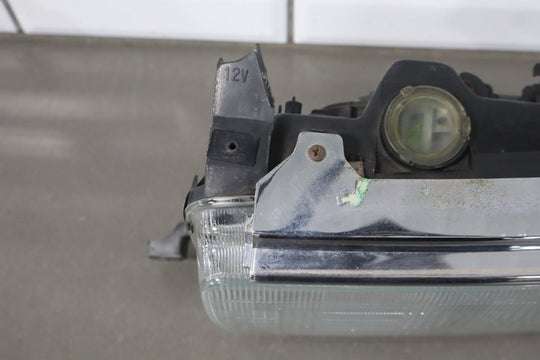 1995 - 1998 Toyota Land Cruiser Left Headlamp W/Chrome Trim 8111060395