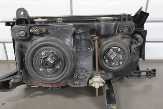 1995 - 1998 Toyota Land Cruiser Left Headlamp W/Chrome Trim 8111060395