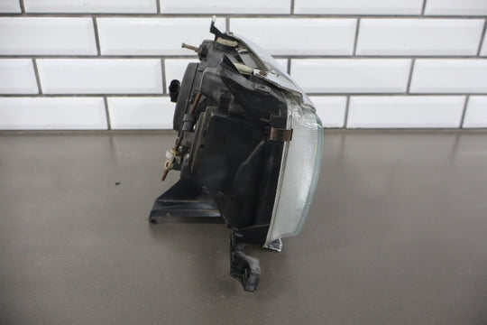 1995 - 1998 Toyota Land Cruiser Left Headlamp W/Chrome Trim 8111060395