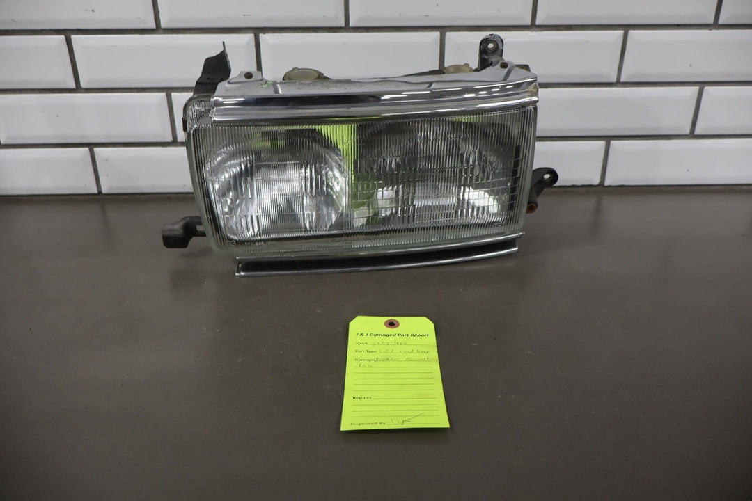 1995 - 1998 Toyota Land Cruiser Left Headlamp W/Chrome Trim 8111060395