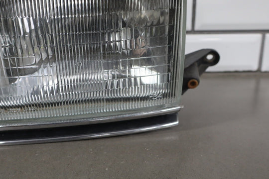 1995 - 1998 Toyota Land Cruiser Left Headlamp W/Chrome Trim 8111060395