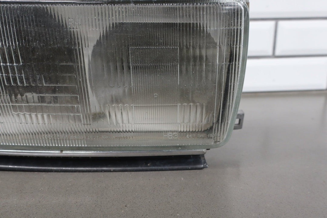 1995 - 1998 Toyota Land Cruiser Right Headlamp W/Chrome Trim 8111060395 OEM