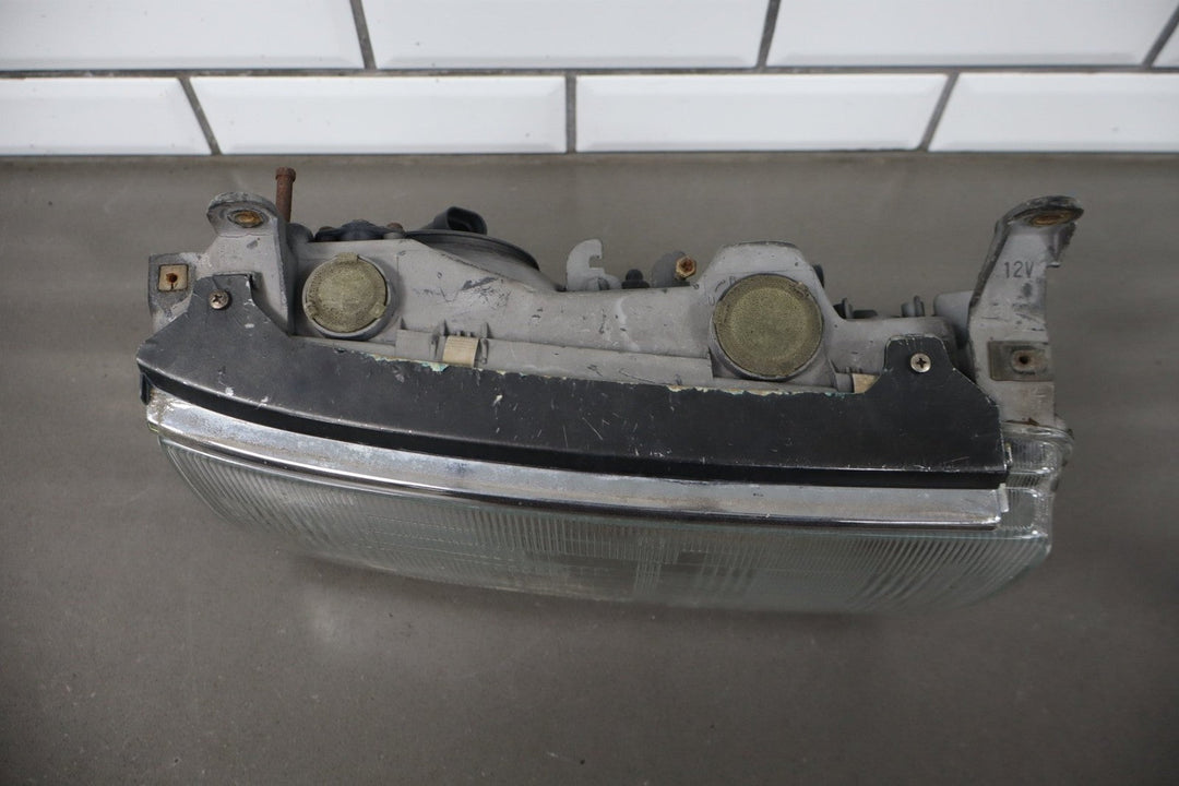 1995 - 1998 Toyota Land Cruiser Right Headlamp W/Chrome Trim 8111060395 OEM