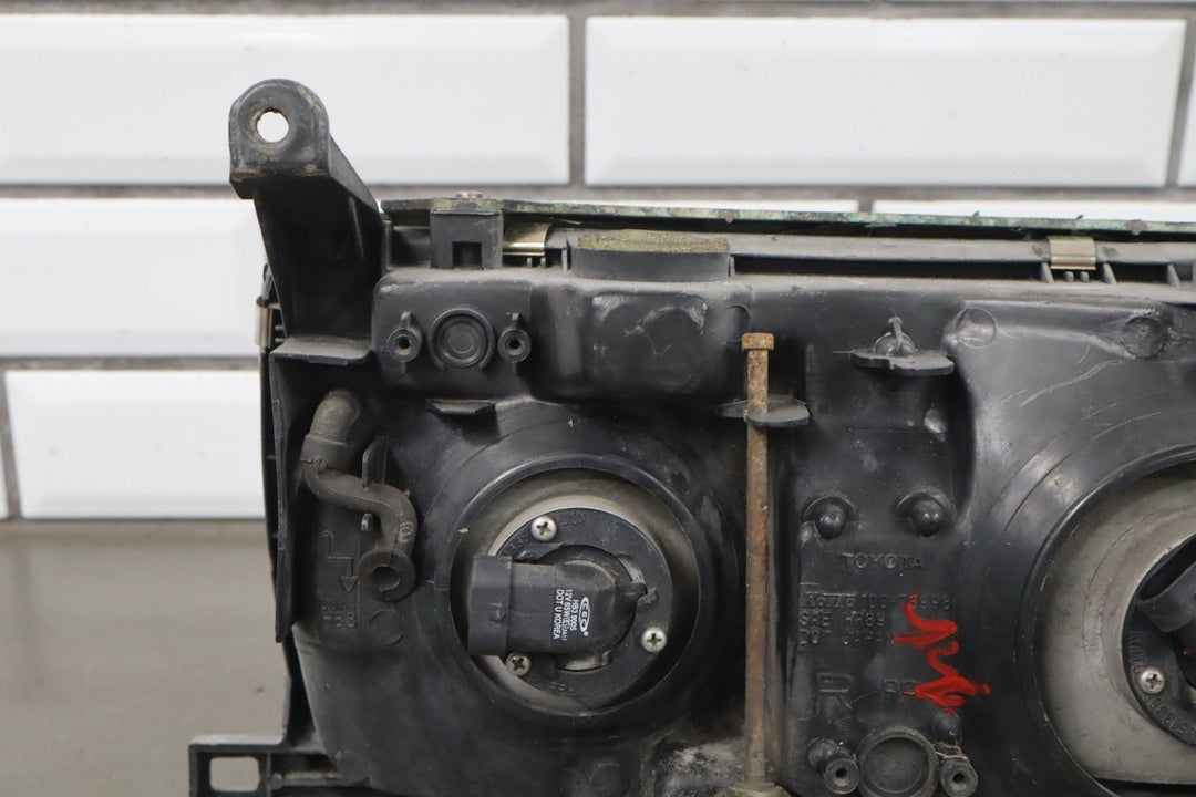 1995 - 1998 Toyota Land Cruiser Right Headlamp W/Chrome Trim 8111060395 OEM