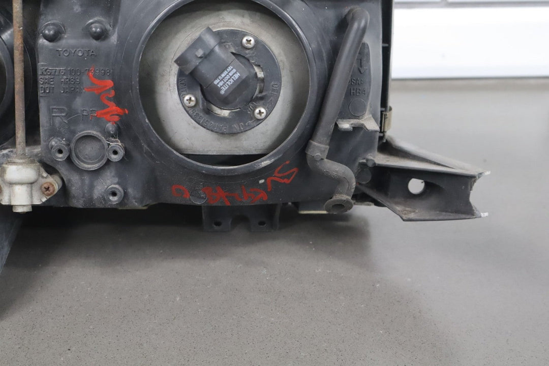 1995 - 1998 Toyota Land Cruiser Right Headlamp W/Chrome Trim 8111060395 OEM