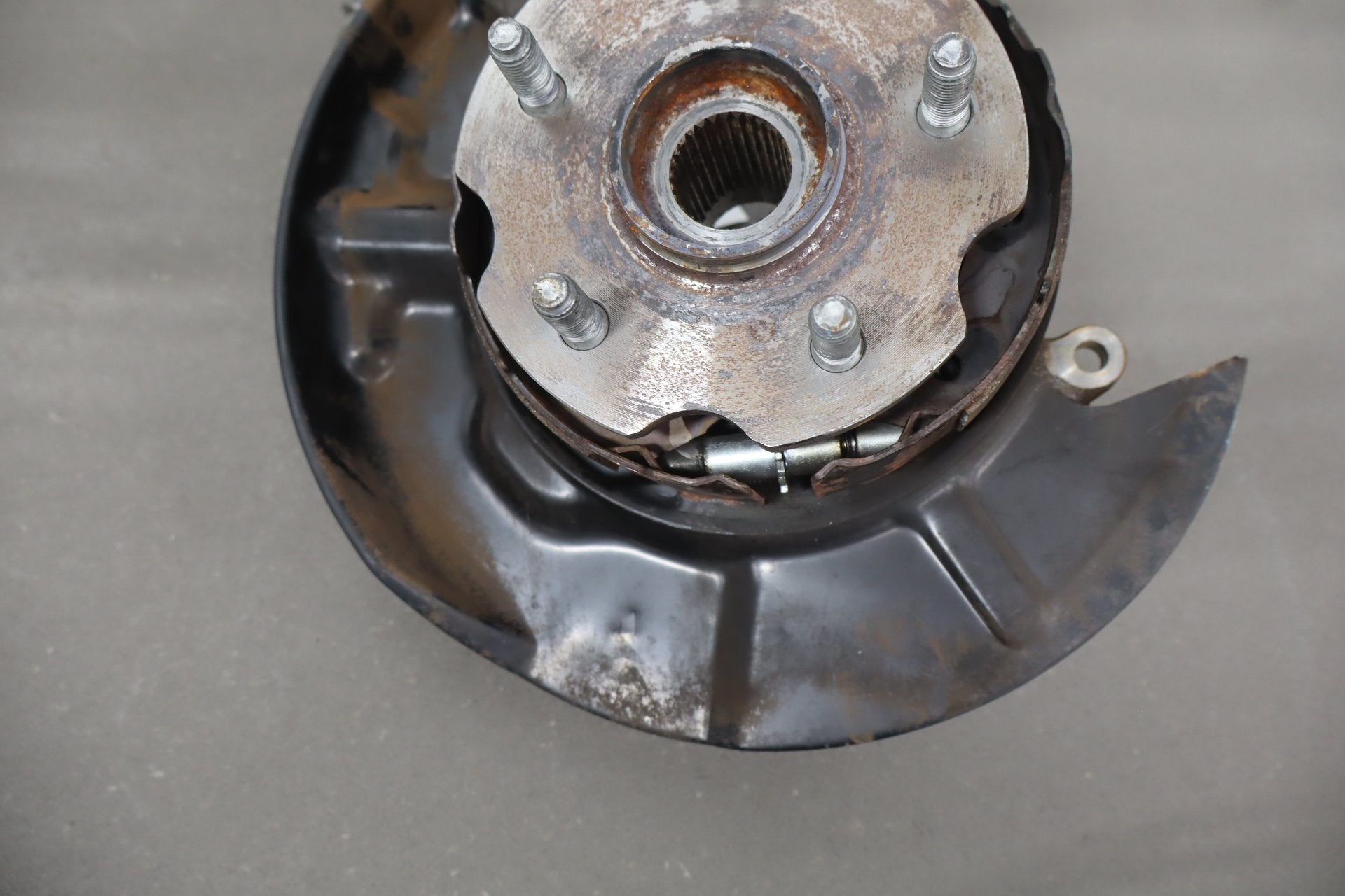 1995-1999 Toyota Crown Left Rear Knuckle Hub Dust Shield OEM JZS151