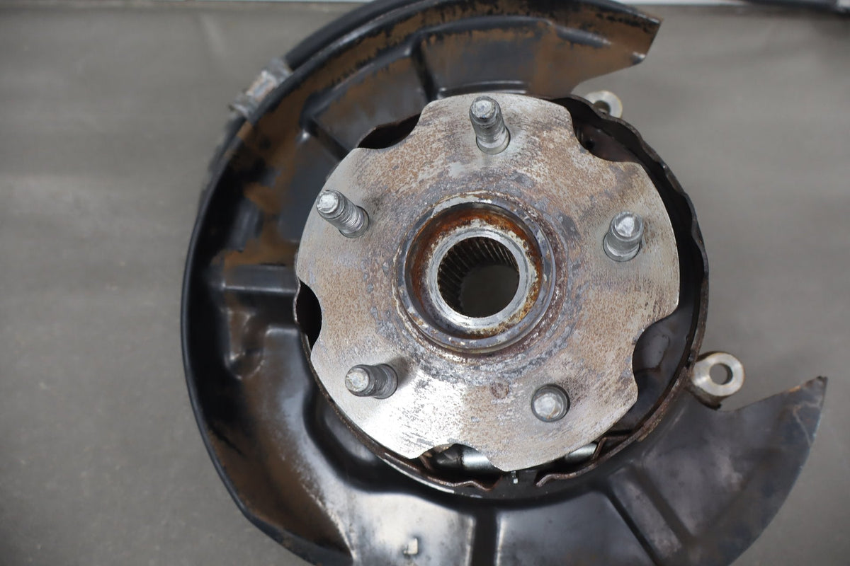 1995-1999 Toyota Crown Left Rear Knuckle Hub Dust Shield OEM JZS151
