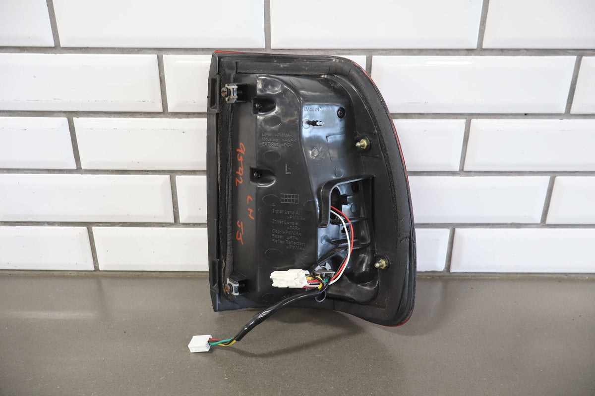 1998-2005 Lexus LX470 Outer Left Tail Light 8156060510 OEM