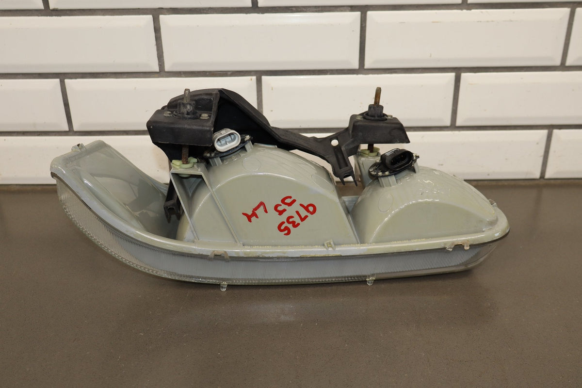 1999-2006 Chevrolet Silverado Left Headlamp 16526133