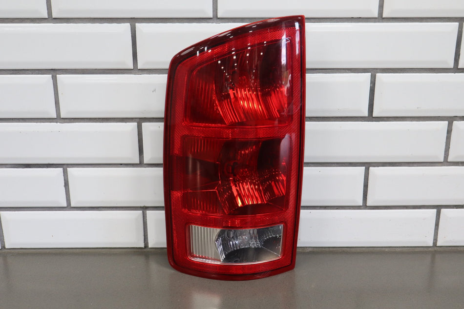 2002-2006 Ram 1500 Left Tail Light 55077347AC OEM