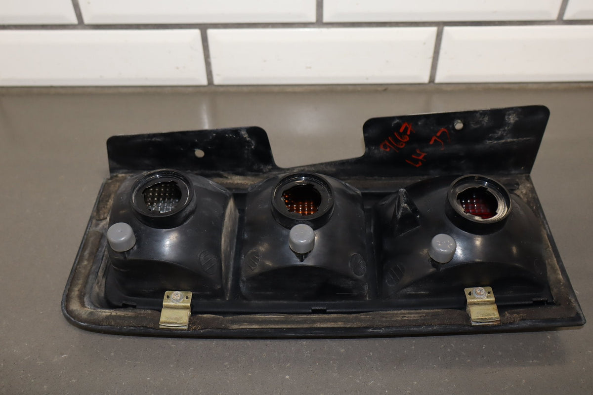 2003-2004 Hummer H2 Left Tail Light 15193458 OEM