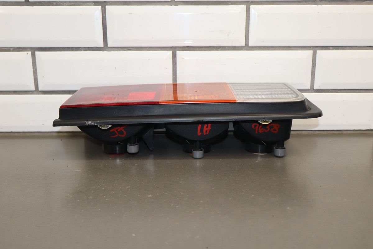 2003-2004 Hummer H2 Left Tail Light 15193458 OEM