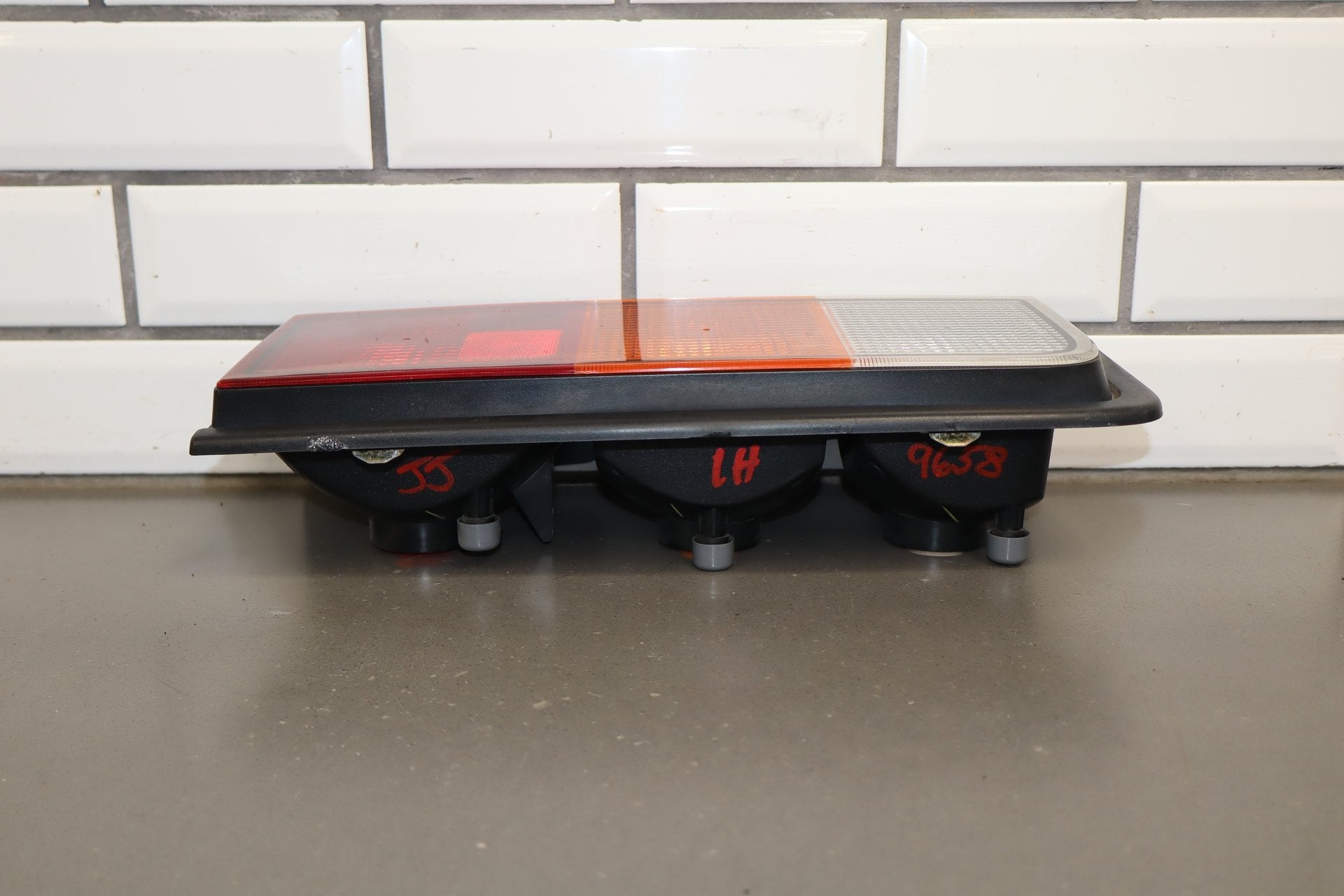 2003-2004 Hummer H2 Left Tail Light 15193458 OEM