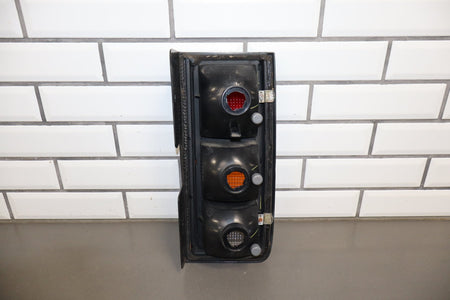 2003-2004 Hummer H2 Left Tail Light 15193458 OEM