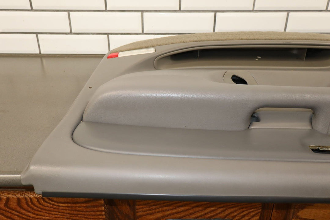 2003 - 2005 GMC Yukon Denali Right Front Door Trim Panel Stone Gray