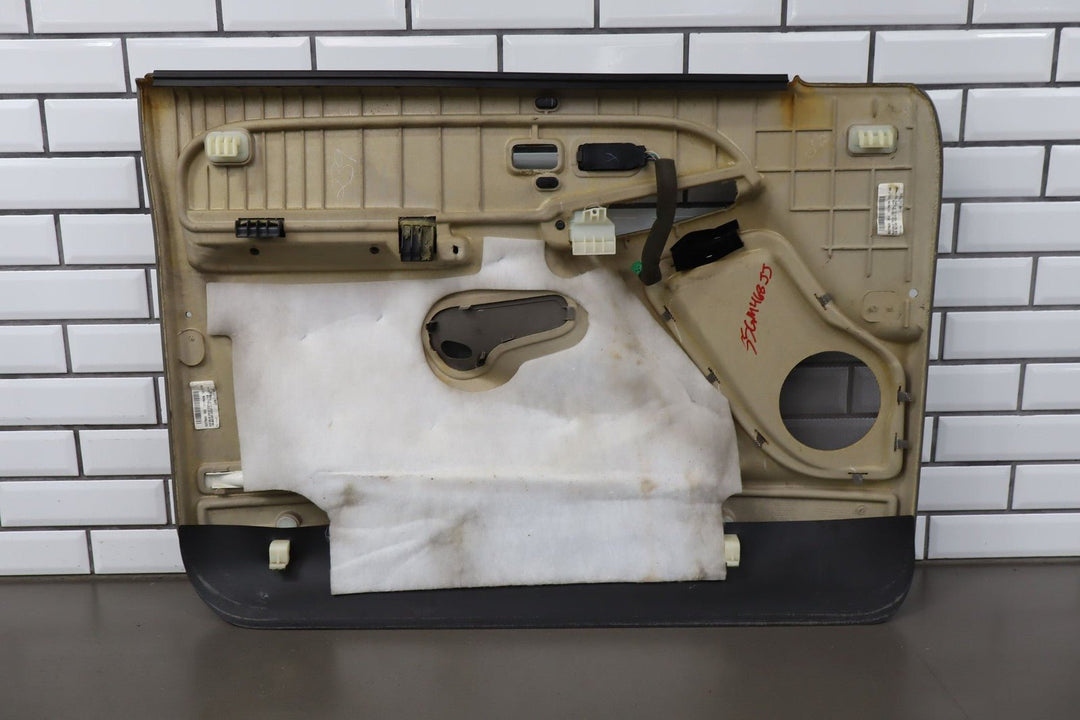 2003 - 2005 GMC Yukon Denali Right Front Door Trim Panel Stone Gray