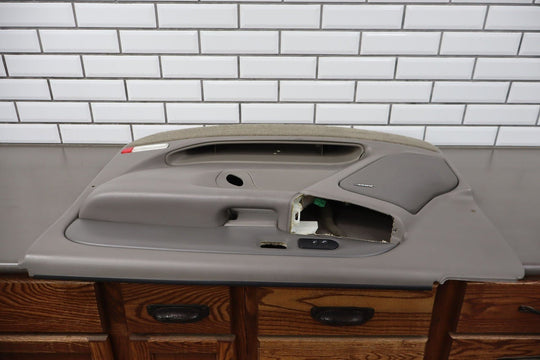 2003 - 2005 GMC Yukon Denali Right Front Door Trim Panel Stone Gray