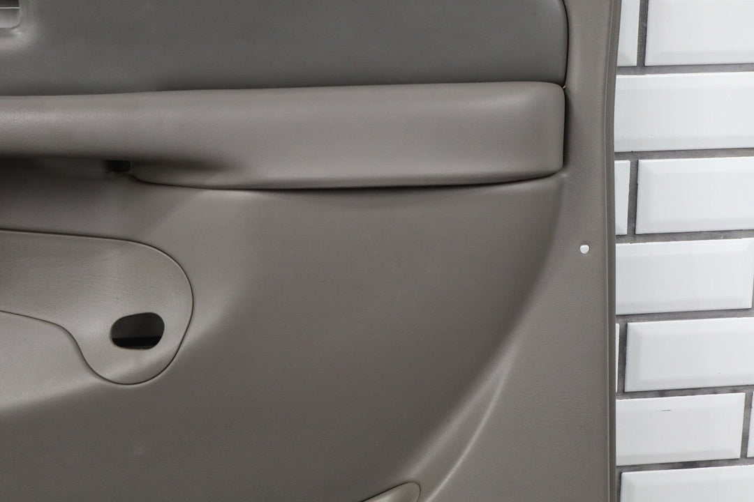 2003 - 2005 GMC Yukon Denali Right Front Door Trim Panel Stone Gray