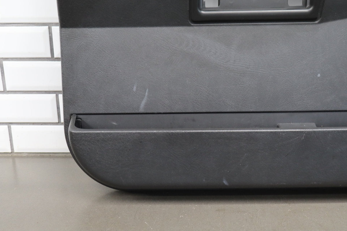 2003-2007 Hummer H2 - Left Front Door Trim Panel Ebony 48 15846876