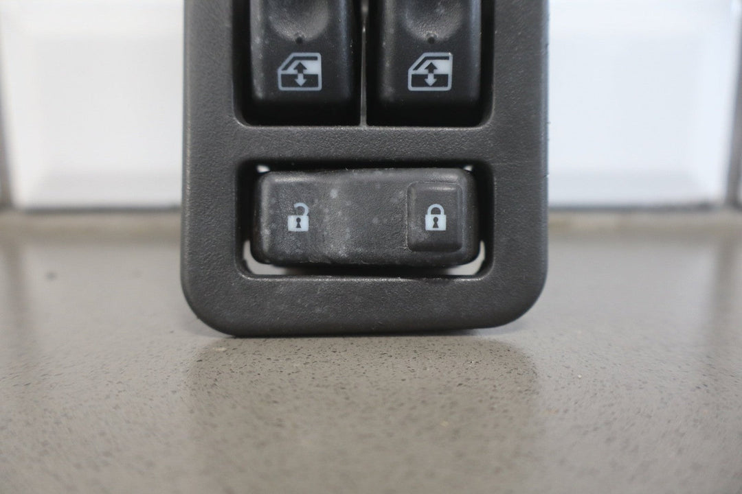 2003 - 2007 Hummer H2 - Left Front Master Window Switch W/ Bezel